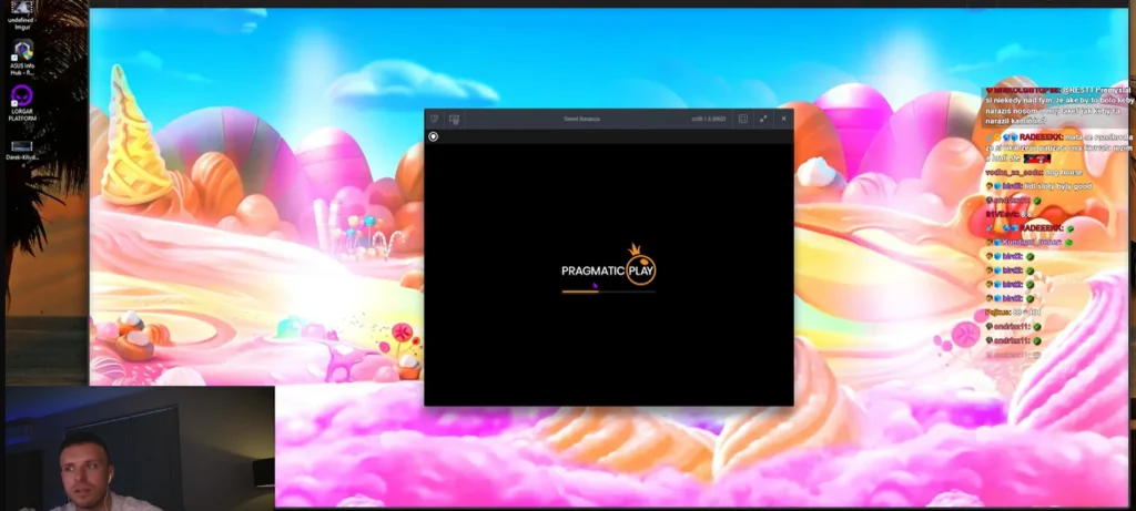 Krupiér pri stole live blackjacku s kartami a žetónmi